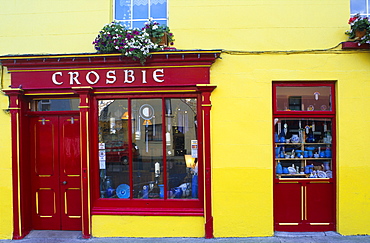 Bright yellow facade of a shop, Ennistymon, County Clare, Ireland, Europe