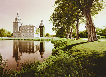 Lake in front of Marsvinsholm castle, Skane, Sweden, Europe