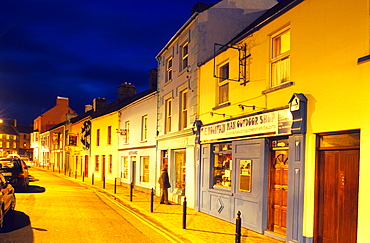 Illuminated street in the evening, Dingle, County Kerry, Ireland, Europe