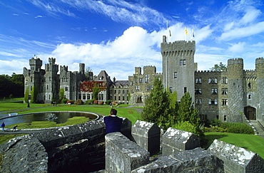 View at the old walls and battlements of Ashford Castle, County Mayo, Ireland, Europe