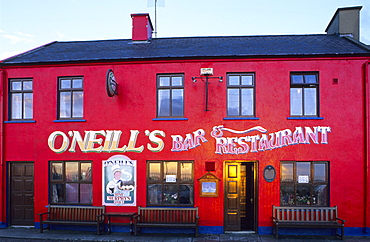 View at the bright red facade of O'Neill's Pub, Allihies, Ring of Beara, County Cork, Ireland, Europe