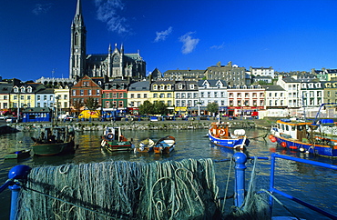 View over the harbour at the houses of the Old Town with St. ColmanâˆšÃ‡Â¬Â¥s cathedral, Cobh, County Cork, Ireland, Europe