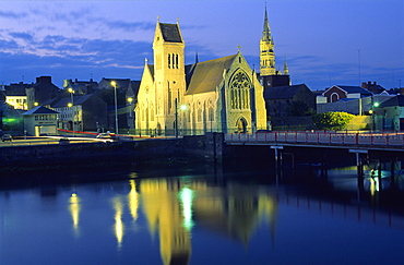 Illuminated church at the river Boyne in the evening, Drogheda, County Louth, Ireland, Europe