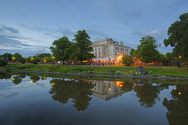 Theatre with young people at dusk, Gothenburg, Bohuslan, Vastra Gotalands lan, Sweden, Europe