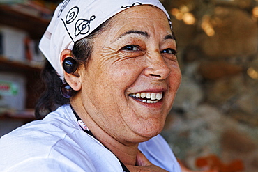 Woman in the kitchen of a restaurant, Island of Ponza, Pontine Islands, Lazio, Italy, Europe