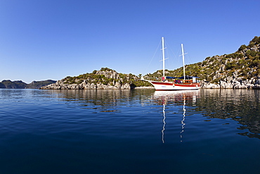 Sailing boat anchoring in pictoresque bay near Kekova, lycian coast, Lycia, Mediterranean Sea, Turkey, Asia