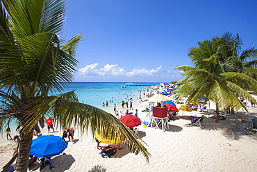 People relaxing and swimming at Doctor's Cave beach, Montego Bay, St. James, Jamaica, Caribbean