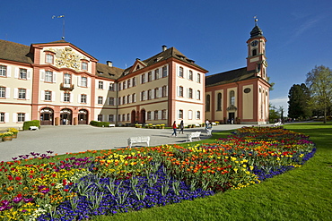 Flower meadow with tulips and Mainau Castle, Mainau Island, Lake Constance, Baden-Wuerttemberg, Germany, Europe