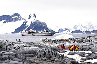 Tourists on Petermann Island off the Antarctic Peninsula, Cruiseship, Antarctica