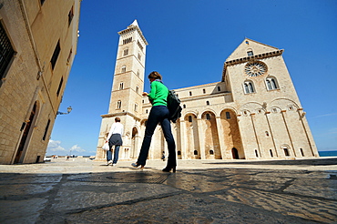 In Trani harbour with Trani Cathedral in the background, Trani, Apulia, Italy