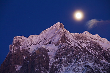 Dusk and Full Moon above the Wetterhorn, near Grindelwald, Winter Ski Resort in the Jungfrauregion, Bernese Oberland, Canton Bern, Switzerland, Europe