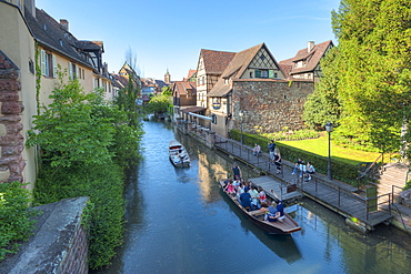 Tourists in boats on the Lauch river, Little Venice, Colmar, Alsace, France, Europe