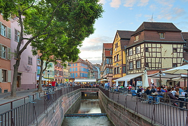 People at the Place de l'Ancienne Douane at dusk, Colmar, Alsace, France, Europe