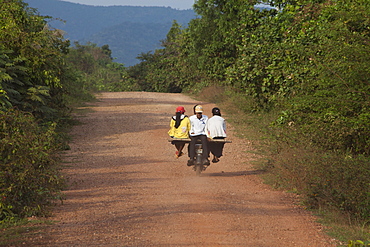 Teenagers on a motorbike in the Kampot province, Cambodia, Asia