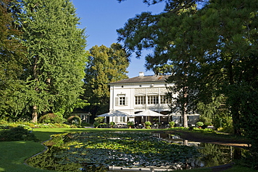 Pond and house at Merian Park, Brueglingen, Basel, Switzerland, Europe