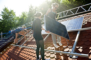 School project, students installing a solar plant, Freiburg im Breisgau, Black Forest, Baden-Wuerttemberg, Germany, Europe