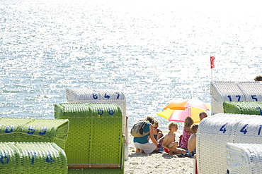 Colourful beachchairs and children on the beach, Wyk, Foehr, North Frisian Islands, Schleswig-Holstein, Germany, Europe