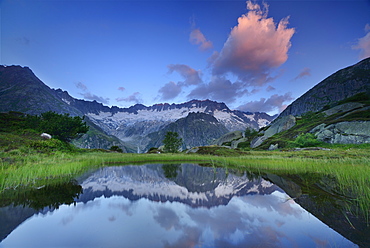 Dammastock reflecting in mountain lake, Dammastock, Urner Alps, Uri, Switzerland