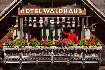 Cowbells on the balcony of Hotel Waldhaus, Gastern Valley, Bernese Oberland, Canton of Bern, Switzerland