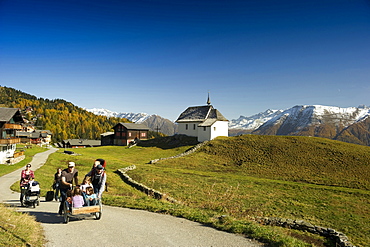 Hiking families at Bettmeralp, Canton of Valais, Switzerland, Europe