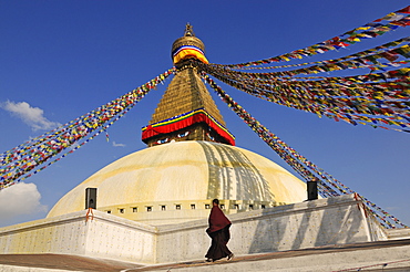 Buddhist monk at Bodnath Stupa, Kathmandu, Kathmandu Valley, Nepal, Asia