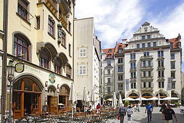 People at the square Platzl in front of the Orlandohaus, Munich, Bavaria, Germany