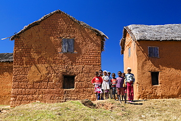 Children and houses west of Antananarivo, Merina people, Madagascar, Africa