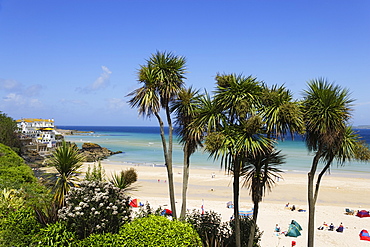 People sunbathing at Porthminster Beach, St. Ives, Cornwall, England, United Kingdom