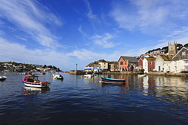 Fishing boat passing harbor, Fowey, Cornwall, England, United Kingdom