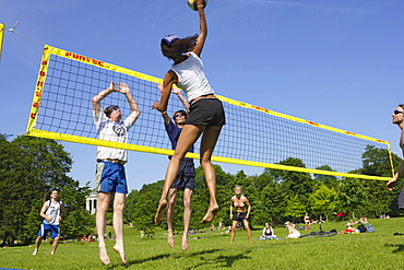 People playing volleyball in the English Garden, Munich, Bavaria, Germany