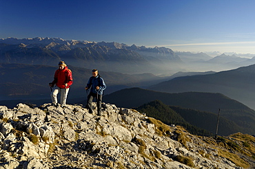 Couple on a hiking tour at heimgarten, Upper Bavaria, Bavaria, Germany