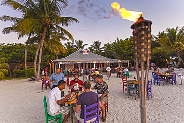 Guests having dinner in restaurant Morada Bay, Islamorada, Florida Keys, Florida, USA