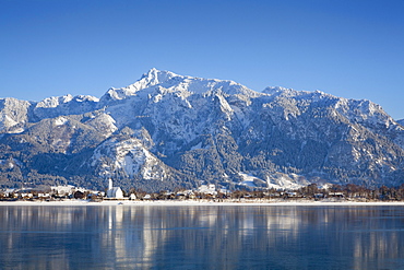 View over Lake Forggensee towards Tegelberg, Allgaeu, Bavaria, Germany