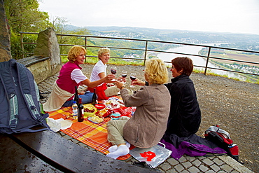 Women having a picnic on top of the Erpeler Ley, Erpel, Rhine, Rhineland-Palatinate, Germany, Europe