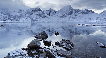 Fjord with reflection of mountains in the water, Stortinden, Flakstadpollen, Flakstadoya, Lofoten, Nordland, Norway