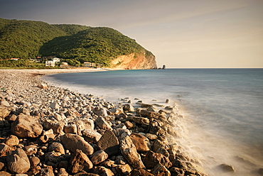 Surf on a rocky beach in Petrovac near Budva, Adriatic coastline, Montenegro, Western Balkan, Europe, long time exposure