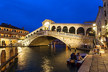 The Grand Canal with Rialto bridge at dusk, Venice, Venetia, Italy, Europe