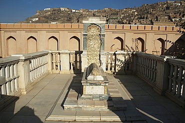 Babur's Tomb with the original headstone and a new marble fence after the restoration of Bagh-i-Babur Shah (Babur's Garden) - Kabul,, Afghanistan