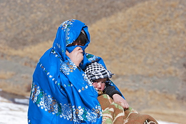 Hazara woman and boy in the Hajigak Pass, Vardak Province, Afghanistan