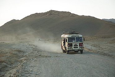Bus approaching Maidan Shar, Vardak Province, Afghanistan