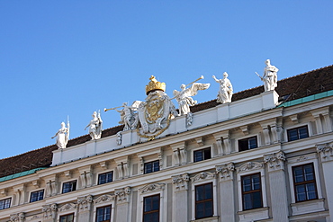 Coat of arms atop the Reichkanzeleitrakt in the Hofburg Imperial Palace, Vienna (Wien), Austria