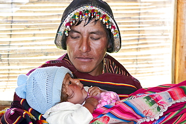 Tarabuco man and his daughter, Jatun Yampara Indigenous Community, Chuquisaca Department, Bolivia