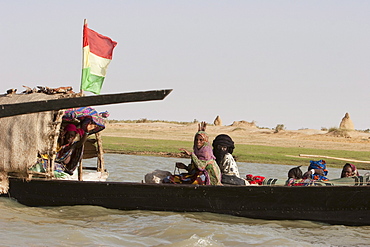 Pinasse carrying cargo and people on the Niger River between Niafunke and Kabara, Mali