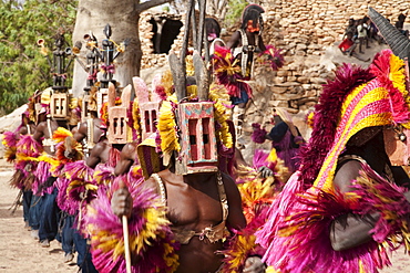 Dancers wearing Kananga masks perform at the Dama celebration in Tireli, Mali