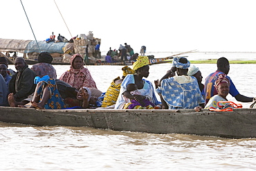 Pinasse on Lake DâˆšÂ©bo, formed by the seasonal flooding of the Niger River, Mali