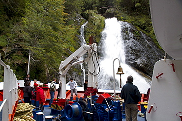 MV Skorpios next to a waterfall in Quitralco Fjord, AisâˆšÂ©n Region, Chile