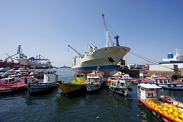 Cargo ship and boats in the harbour, Valparaiso, Valparaiso Region, Chile