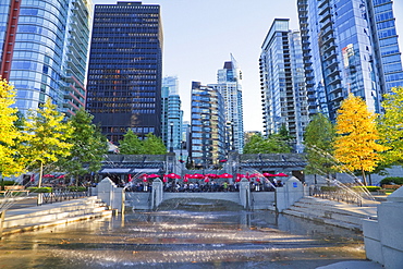 Water park and residential skycrapers in Coal Harbour, Vancouver, British Columbia, Canada