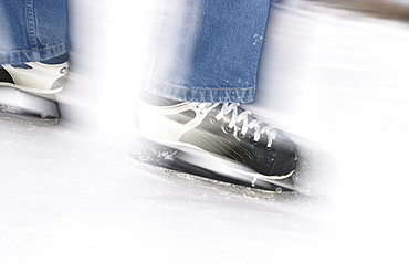 Skates in Motion on Ice