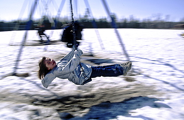 Little Girl on a Swing, Pelly Crossing, Yukon.